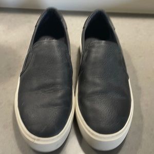 Black leather UGG slip on sneakers